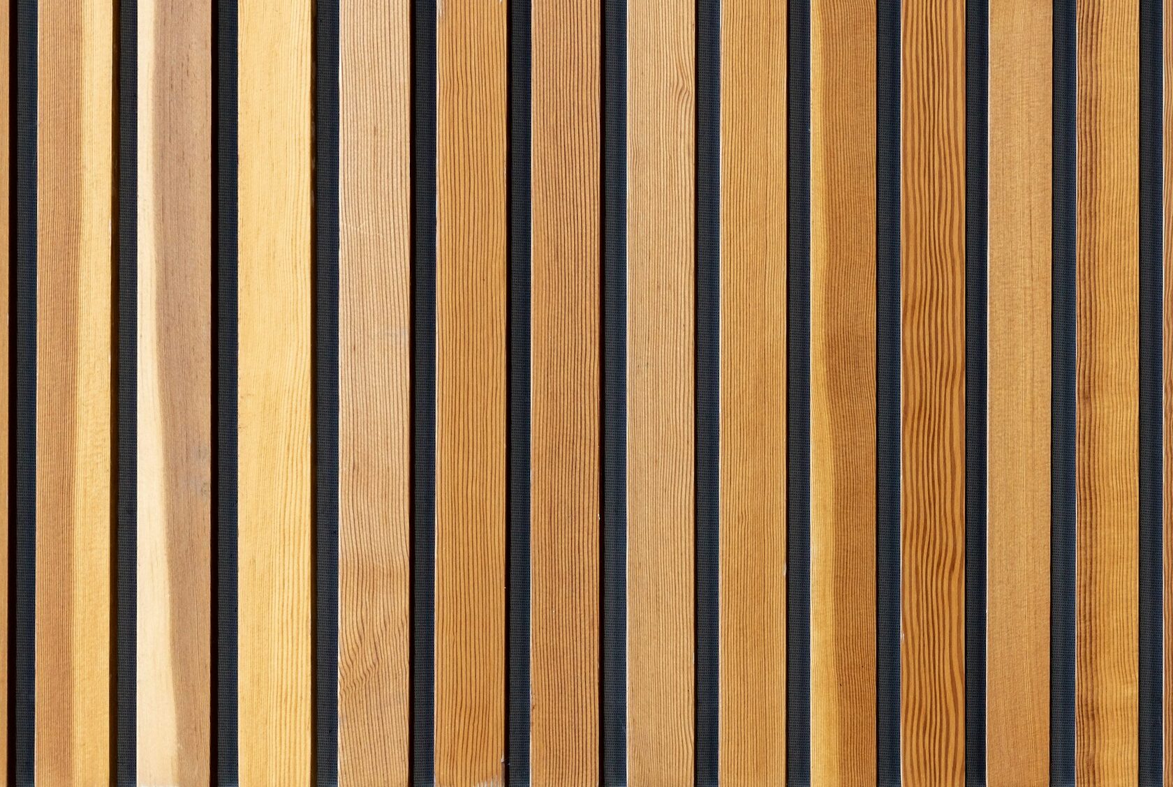 Slatted timber wall panelling introducing texture to an interior